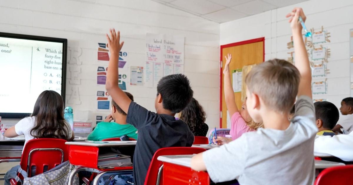 Bill earmarking millions for school literacy improvements signed by Stitt