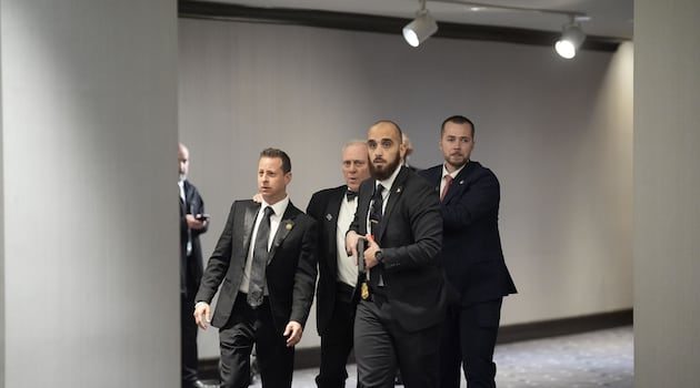 Donald Trump rushed from White House Correspondents’ dinner after gunman fires shots